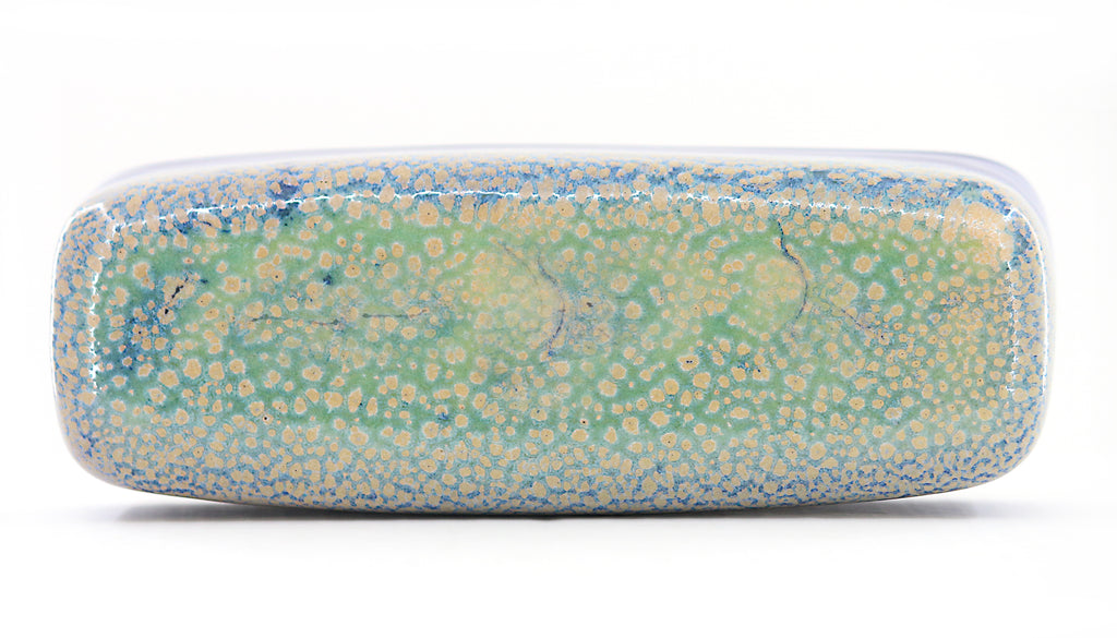 Stoneware butter dish featuring a Sea Foam Blue glaze which presents as a white speckled wash over cobalt blue--top view