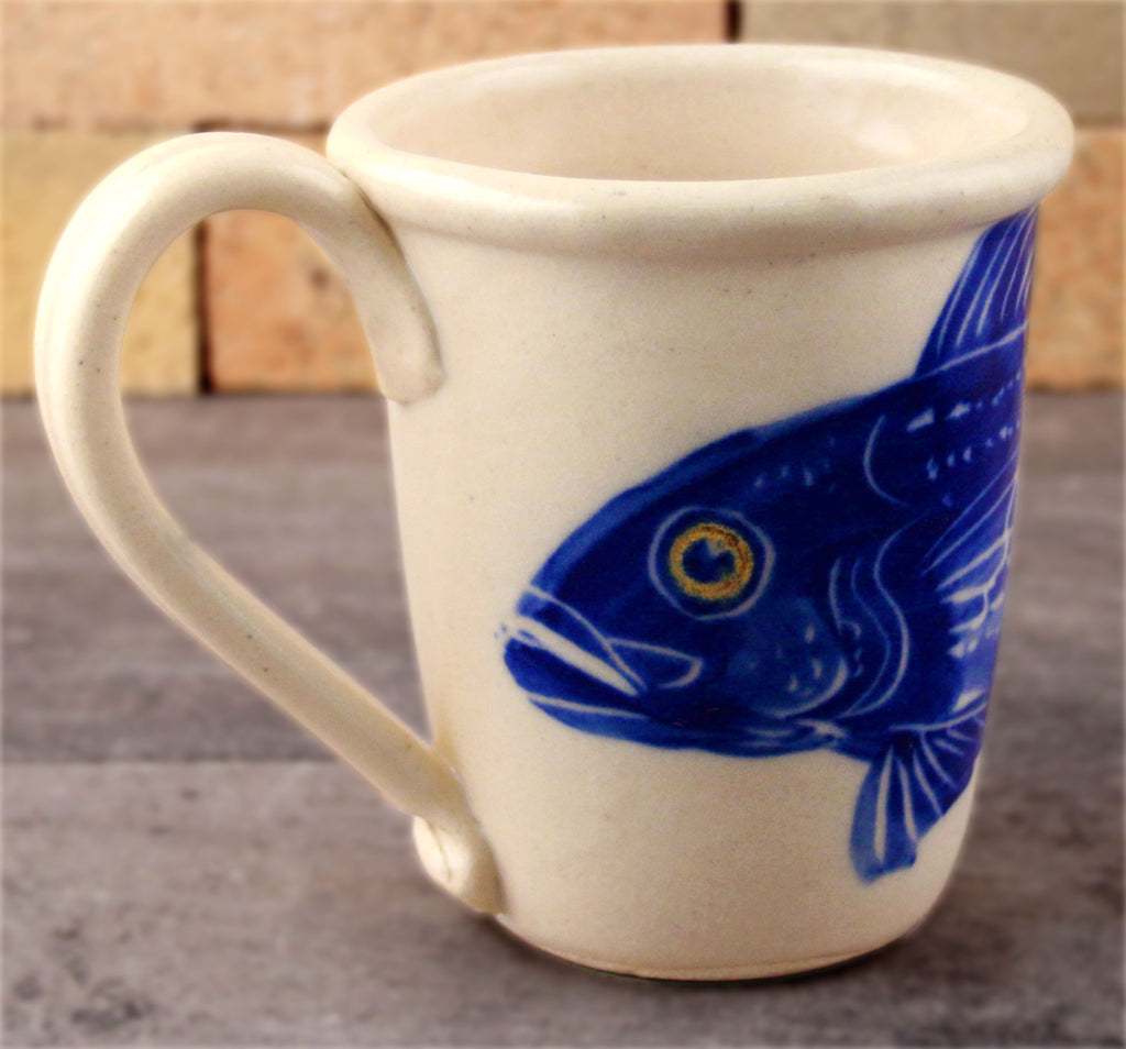 Painted Fish purchases enamel ware mugs